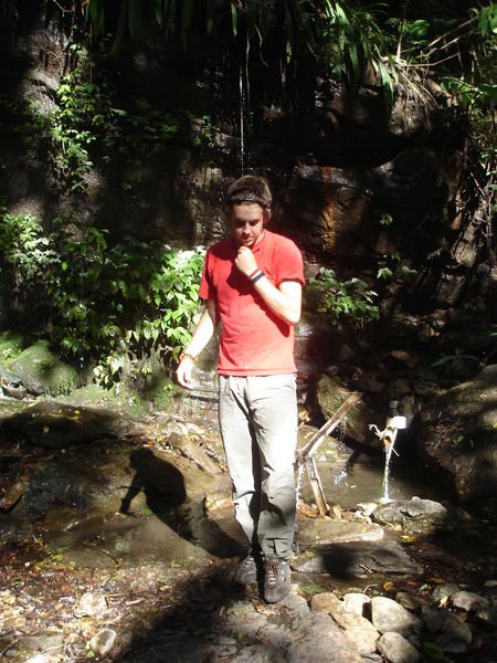 Chris infront of the little waterfall