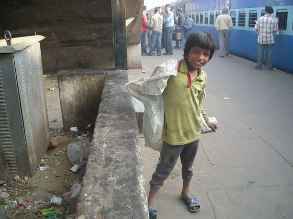 Beggar Boy at the station