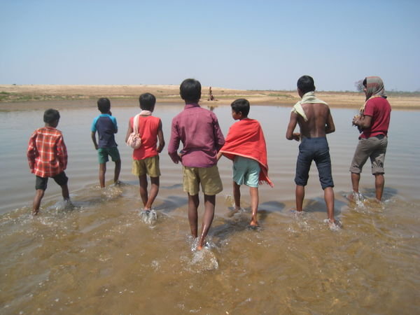 Children walking to the river