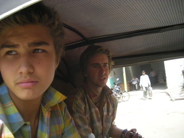 Riding in a tuk tuk searching for an ATM