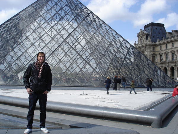 Chris infront of the Louvre