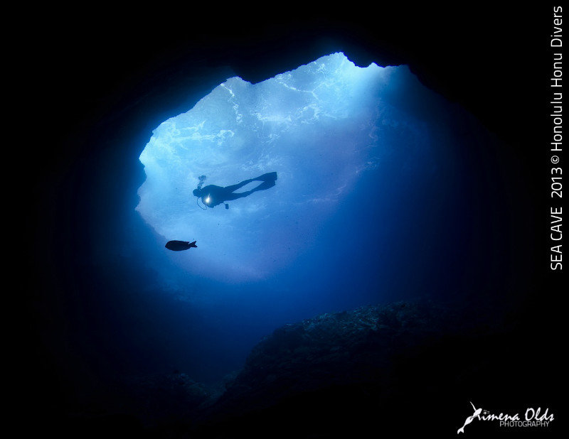 Sea Cave. Diver and blue surge