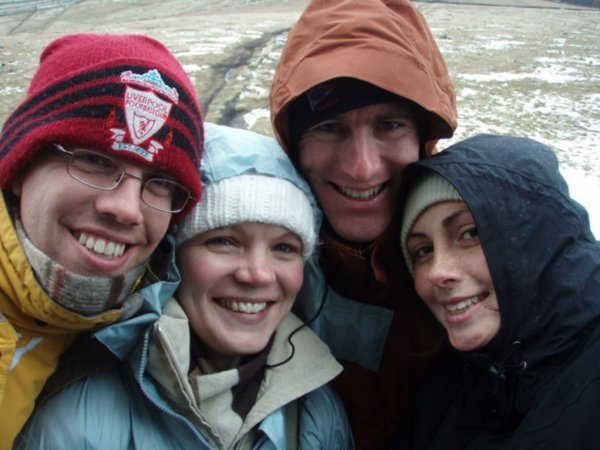 Four freezing happy adventurers