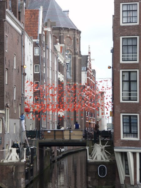 Amsterdam and its canals decorated for Queens Day