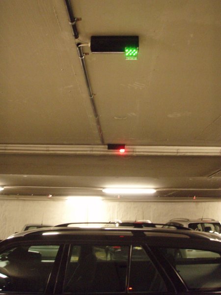 Clever parking system, green light means a free space