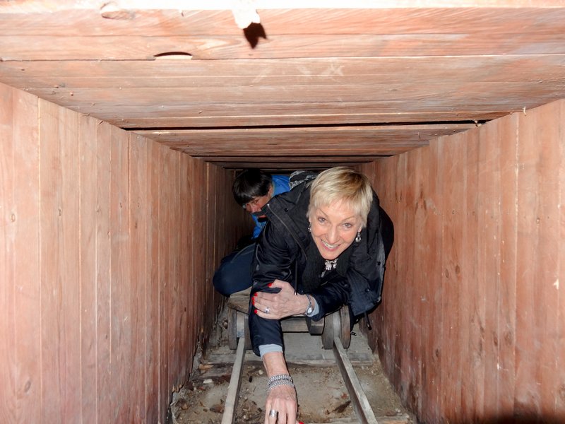 Mum crawling through the tunnel