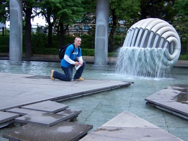 Dan by a fountain