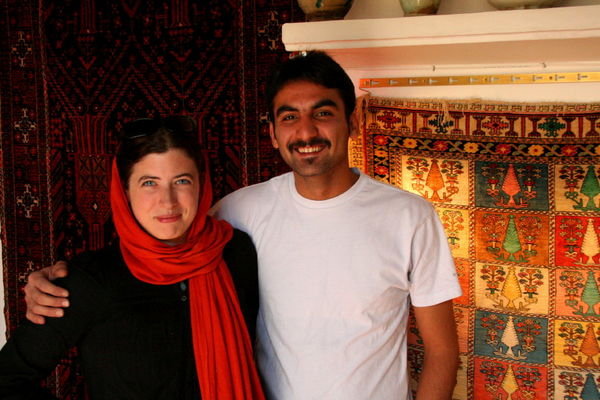 Jane and Babak among the carpets in Yazd