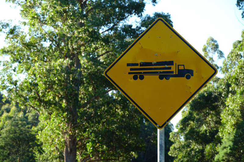 huon highway - log truck sign