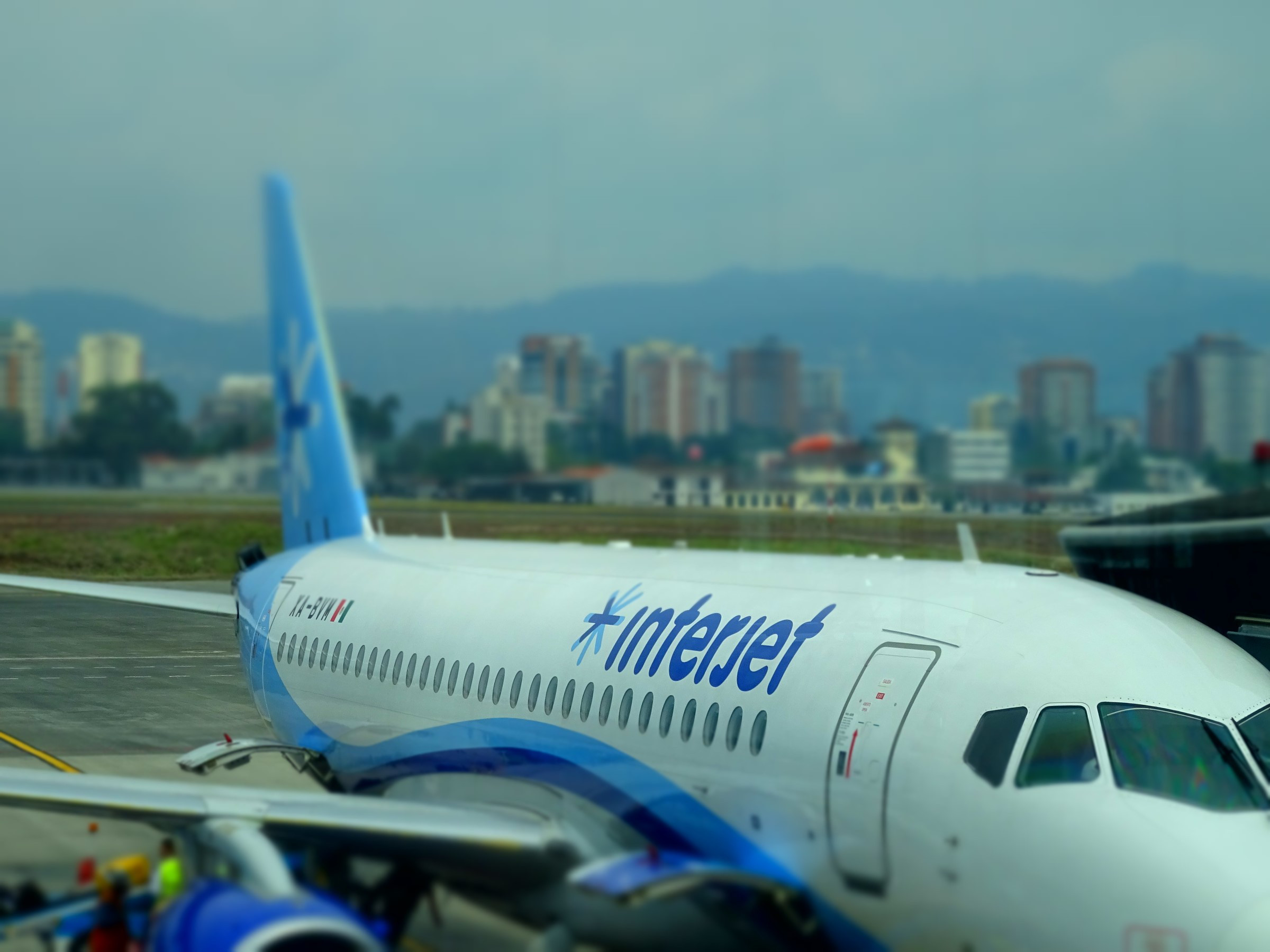 how to get to guatemala city airport for early flight check in