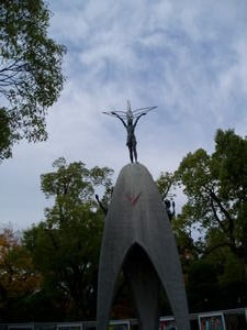 Sadako, holding up a crane 