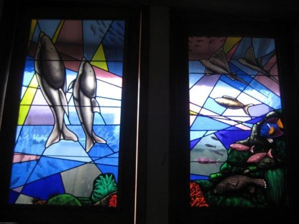 Nautical themed stained glass windows at the church on Santa Cruz