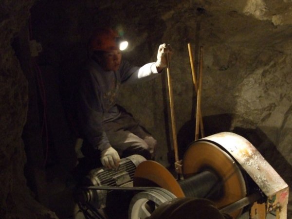 Miner using winch