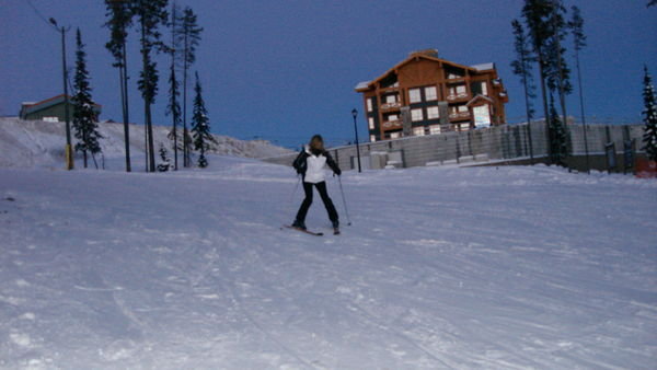 Tania skiing back to the condo