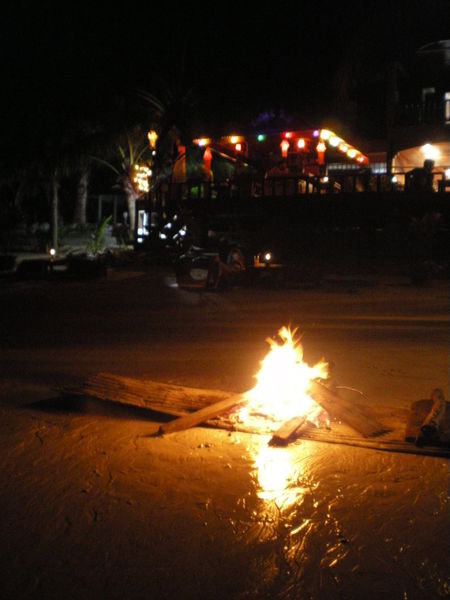 Fire on the beach where we were having a meal