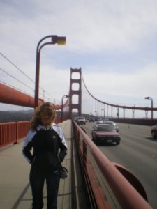 Sel eating her hair as we hiked across the bridge in gale force winds!
