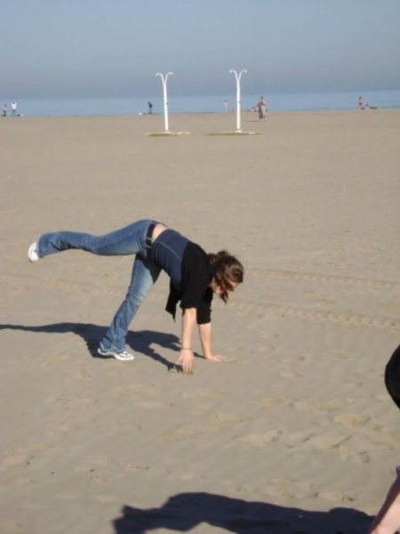 hand stand competition on the beach in valencia