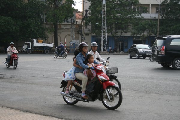 FAMILY ON THEIR SCOOTER