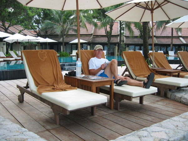 Ken writing his blog at the pool side