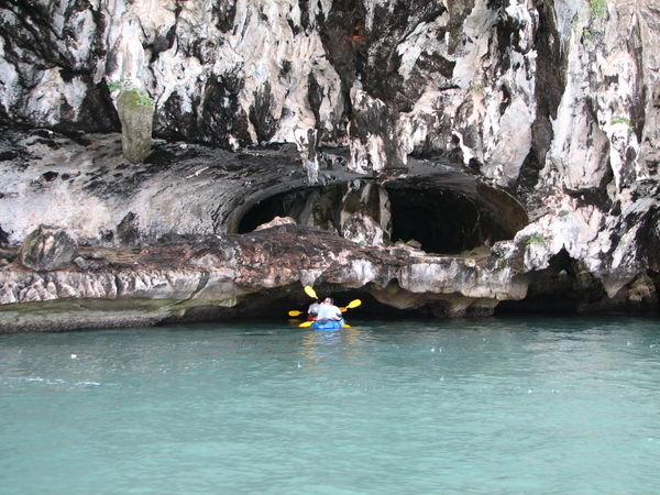 Canoe under caves