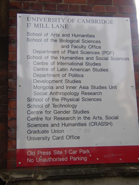 Sign on one of the colleges buildings