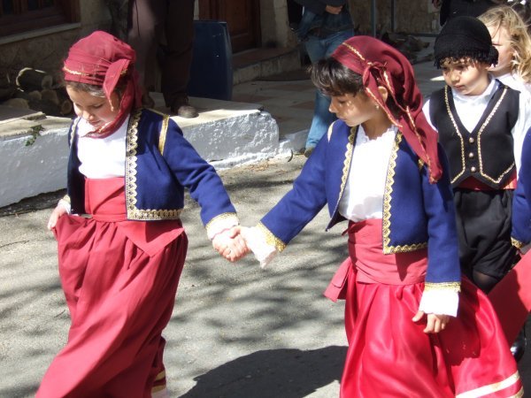 cute Greek school children in traditional dress