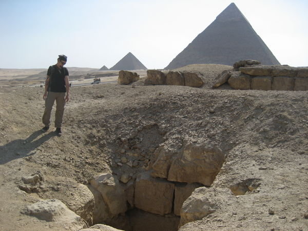 Dan inspecting tomb