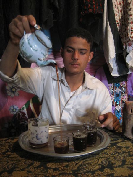 Fahim pouring tea
