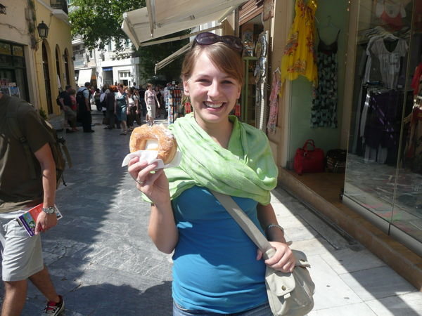 enjoying a donut in athens