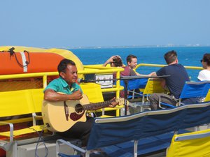 Entertainment on board the Isla Mujeres ferry