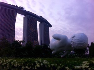 Giant sculpture with Marina Sands in background