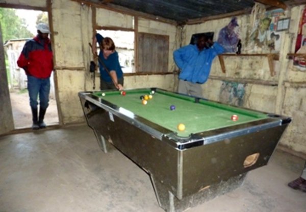Playing pool in the local pub.