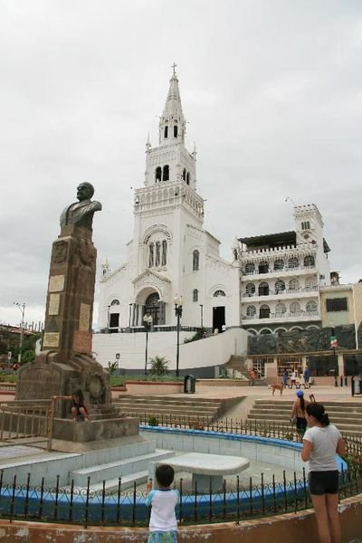 Statue of Alfaro and Church in Montichristi