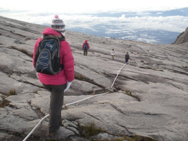 Sar starting the long cold journey down over the granite