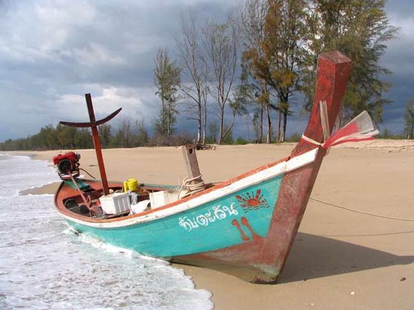Beached Lontail Boat