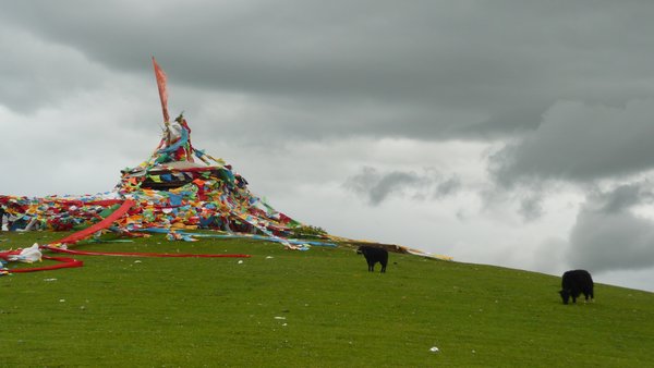 Prayer flags on a hill over Litang