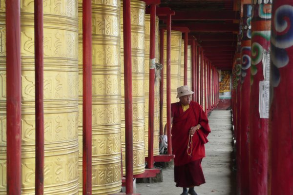 Prayer wheels around Tagong monastery