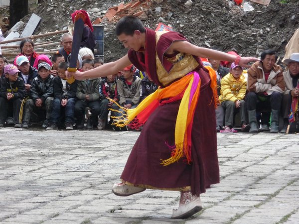 A monk dancing to Jay-Z