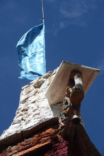 Prayer flag above a Tibetan village house.