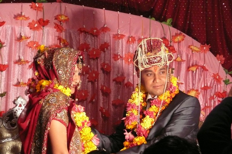 Ajay and his bride give the cue for the rush to the buffet to commence