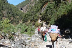 Porters take a rest on the way to Namche