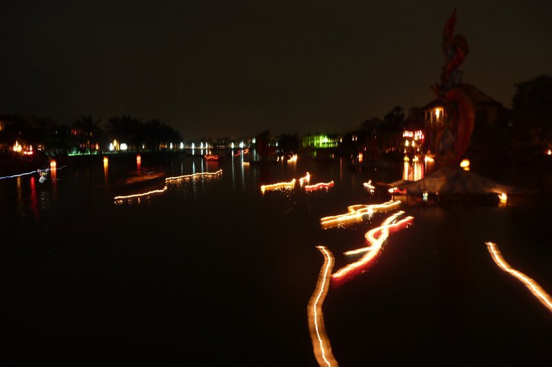 Lanterns move across the water