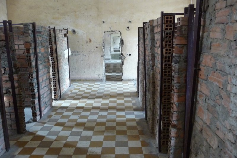 The hastily constructed cells in former classrooms at S21