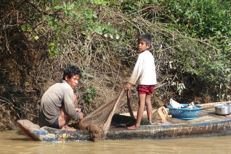 Fishing for dinner on the river between Battambang and Siem Reap