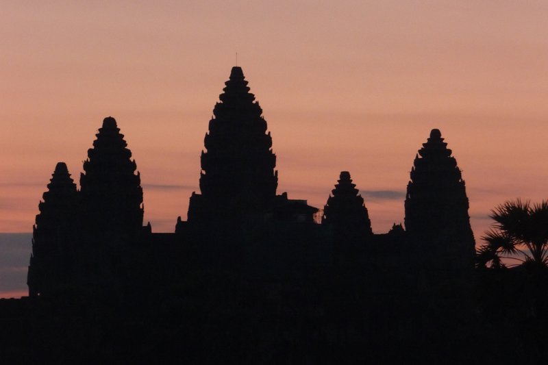 The towers of Angkor Wat at sunrise