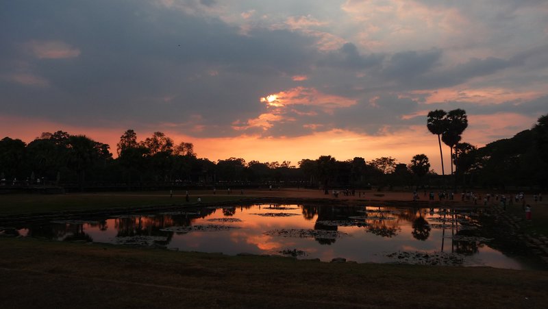 Looking towards the West gate of Angkor Wat at sunset from the temple