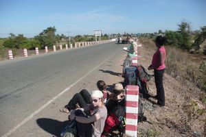 Waiting at the roadside to leave Cambodia