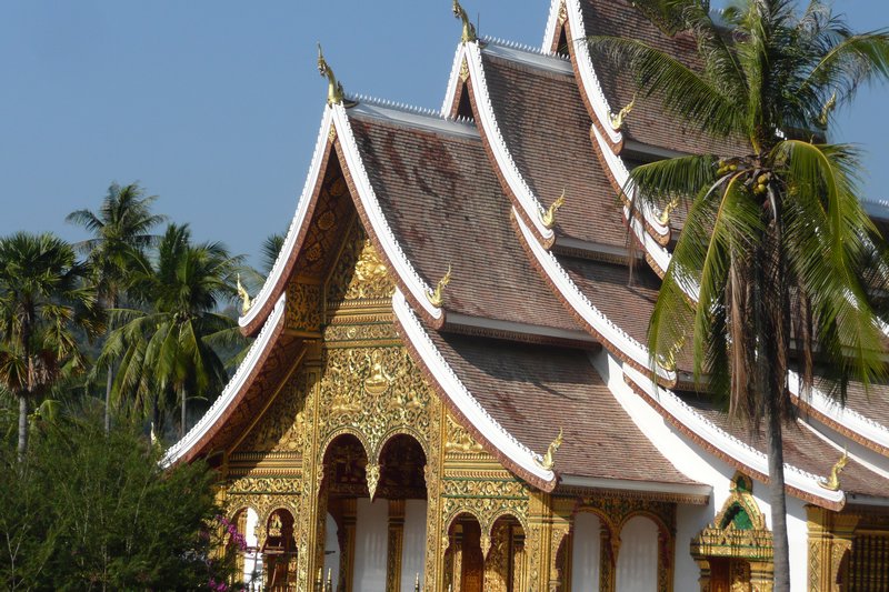 A multi tiered roof and fronting of a wat, Luang Prabang