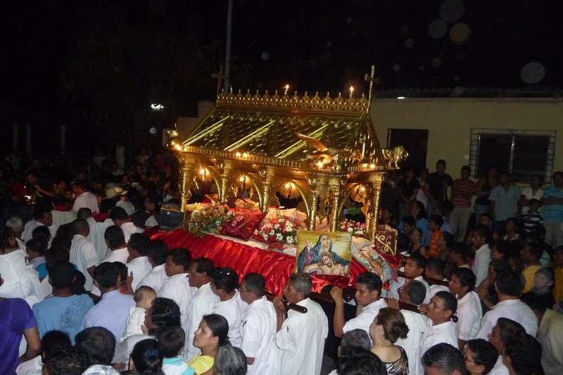 Jesus' clear coffin is paraded through town
