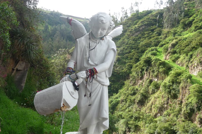 A statue pours water at Santuario de Las Lajas